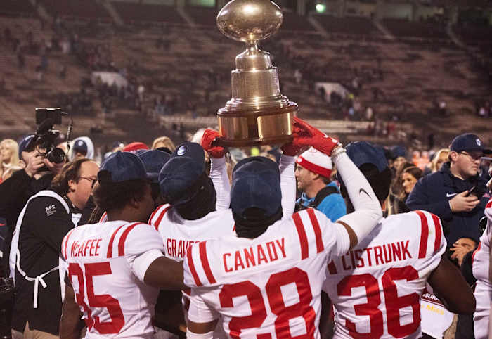 Ole Miss celebrates its Egg Bowl win over Mississippi State at Davis Wade Stadium in Starkville, Miss., Thursday, Nov. 23, 2023.